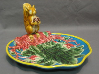 A Majolica style dish decorated a squirrel 10"