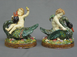 A pair of Majolica style pottery figures of ducks 11"