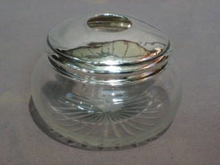 A circular cut glass hair tidy with silver lid Birmingham 1920
