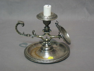 A Continental silver plated chamber stick incorporating a watch stand
