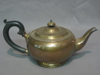A circular silver teapot Birmingham (marks rubbed) by the Goldsmiths and Silversmiths Co. 14 ozs