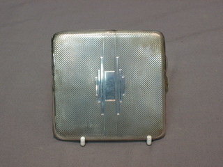 An Art Deco silver cigarette case with engine turned decoration Birmingham 1935 4 ozs