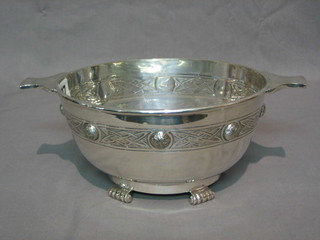 An Art Nouveau oval silver plated twin handled dish 10"