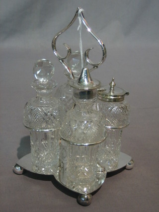 A silver plated 4 piece bottle cruet