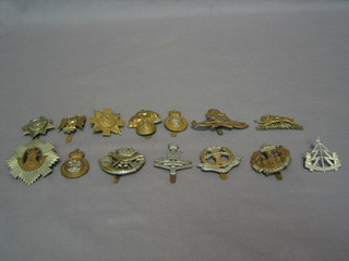 14  various cap badges - Royal Scots Grays?, North & 7th Royal Dragoon Guards, 7th Queens Own Husaars, The Scots Guards, Kings Own, Cornwall Light Infantry, Middlesex Regt., Royal Fusiliers, Royal Scots, Essex Regt., Reconnaissance Corps, Royal Artillery, Arm Catering Corps, Prince of Wales Own