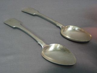  A George III silver fiddle pattern table spoon, London 1811 and a Continental fiddle pattern table spoon