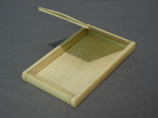 A carved ivory case with hinged lid 6"