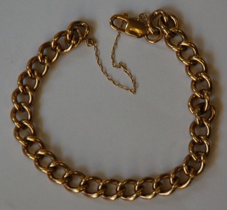 A 9ct gold curb link bracelet (approx 32 grams)