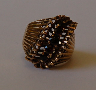A gold dress ring set garnets