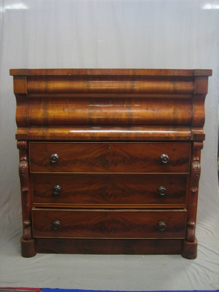 A  Victorian mahogany Scotts Baronial chest fitted a secret drawer above 4 long drawers with tore handles and carved columns to the sides, 49"
