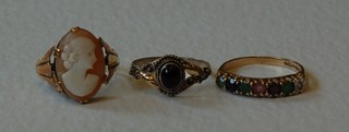 A lady's 9ct gold dress ring and 2 other dress rings