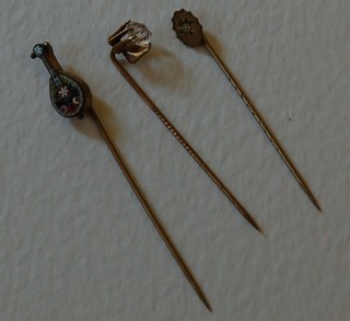 A micro mosaic stick pin decorated a mandolin and 2 other stick pins