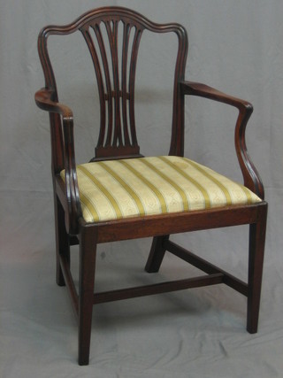 A Hepplewhite style camel back dining chair with upholstered drop in seat, raised on square tapering supports