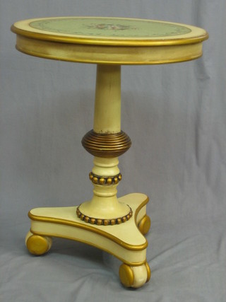 A circular 19th Century style painted table, raised on a turned column with triform base 24"