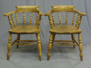 A set of 4 20th Century beech Captain's chairs
