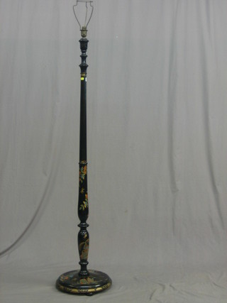 A 1930's ebonised standard lamp with chinoiserie decoration