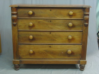 A Victorian mahogany Chanel Islands chest with inverted breakfront top, fitted 4 long drawers with tore handles on bun feet, 43"