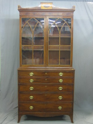 A Georgian inlaid mahogany secretaire bookcase, the raised top with moulded cornice the interior fitted adjustable shelves enclosed by astragal glazed panelled doors, the base fitted a well fitted secretaire drawer above 3 long drawers, raised on bracket feet 43"