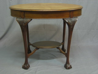 An Edwardian oval bleached mahogany Chippendale style 2 tier occasional table, raised on cabriole supports 36"