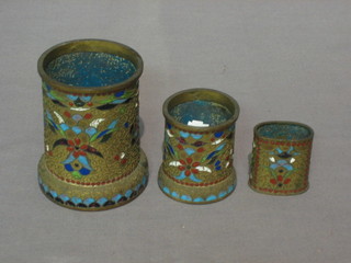 A circular champe leve enamel jar 3" and 2 others 2 1/2" and 2"