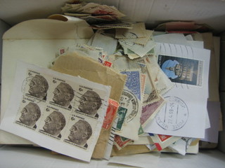 A small collection of postcards and loose stamps