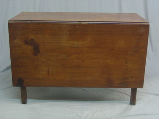 A Georgian mahogany drop flap gateleg dining table, raised on square supports 42"