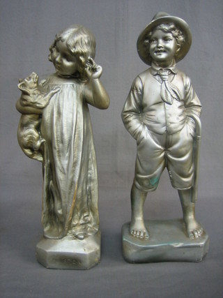 2 1930's silver painted plaster figures of a standing boy and girl 17"