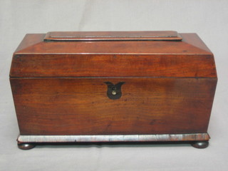 A Victorian mahogany sarcophagus, twin compartment tea caddy with hinged lid and brass ring handles, 12"