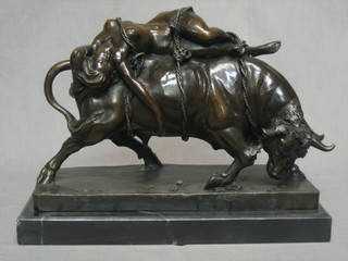 After Debvt, a cast bronze figure of a bull, with reclining lady strapped to its back 16"
