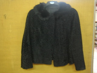 A lady's Persian lamb cape with black fur collar by Calman Links of London