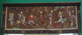 An Eastern embroidered section of fabric depicting figures 49" x 20" (some damage)