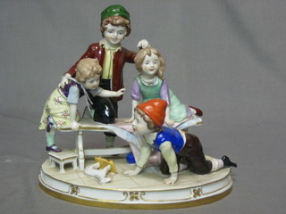A Sitsendorf style figure group of children 9"
