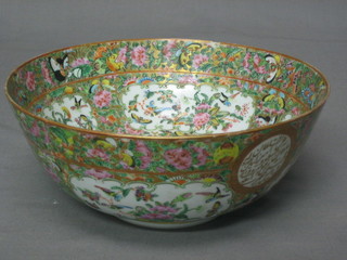 A 19th Century circular Canton famille rose porcelain bowl with floral decoration, 9"