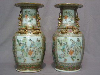 A pair of 19th Century Canton famille rose porcelain  vases of club form with applied dragon handles, decorated court figures 17" (rims f and r)
