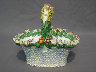 A 19th Century floral encrusted model of a basket 8 1/2" (some damage)