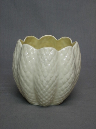 A Beleek circular white glazed pottery vase, the base with green Beleek mark 4"