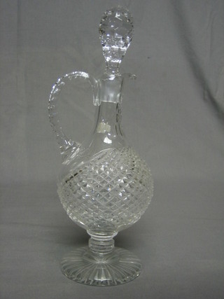A cut glass claret jug and stopper 14"