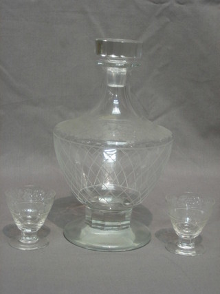 An Art Deco Continental 7 piece etched glass liqueur set comprising club shaped decanter and 6 glasses