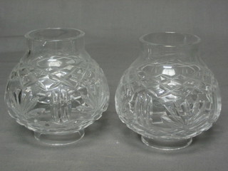 A pair of cut glass globular candle shades 4"