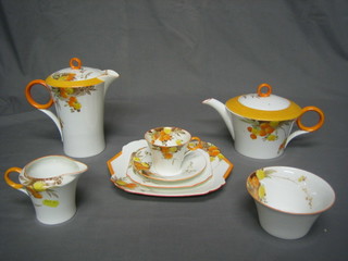 A 24 piece Shelley tea/coffee service comprising teapot, hotwater/coffee pot, 2 sugar bowls (1 cracked), milk jug, 2 cake plates 10", 6 square tea plates 6 1/2", 5 cups (2 cracked) and 6 saucers, the bases marked Shelley 12255 RD 781613