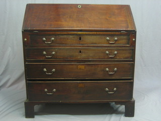 A Georgian mahogany bureau, the fall front revealing a well fitted interior above 4 long drawers, raised on bracket feet 39"
