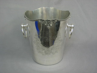 A circular engraved silver plated twin handled wine cooler with cast vinery decoration 8"
