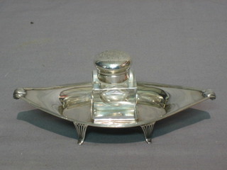 A square cut glass inkwell raised on a silver twin handled tray, Chester 1919