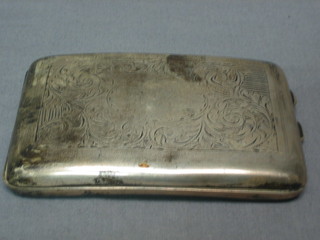 A silver cigarette case with engraved decoration, Birmingham 1942, 4 ozs