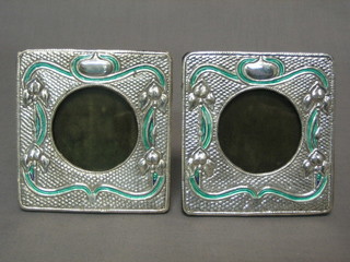A pair of small Art Nouveau style silver and enamelled easel photograph frames 4"