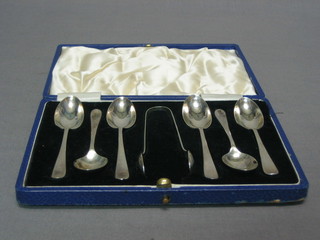 A cased set of 6 silver Old English rat tail pattern teaspoons, Birmingham 1935 with tongs, cased, 2 ozs 