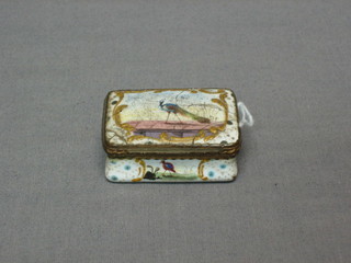 An 18th/19th Century rectangular "Battersea" enamelled pill box, the lid decorated a peacock, the hinged interior marked Gage de mon amour, 2" (crazed and f, lid chipped)