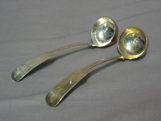 A pair of Scots 18th/19th Century Provincial silver fiddle patterned sauce ladles, marked BA, a thistle and MLO, 2 ozs