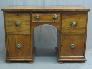A 19th Century mahogany pedestal sideboard fitted 1 long drawer flanked by 2 short drawers above a double cupboard, 51"