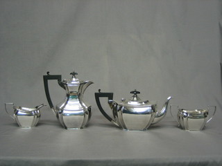 A Georgian style 4 piece rectangular silver plated tea service comprising teapot, twin handled sugar bowl, hotwater and cream jug